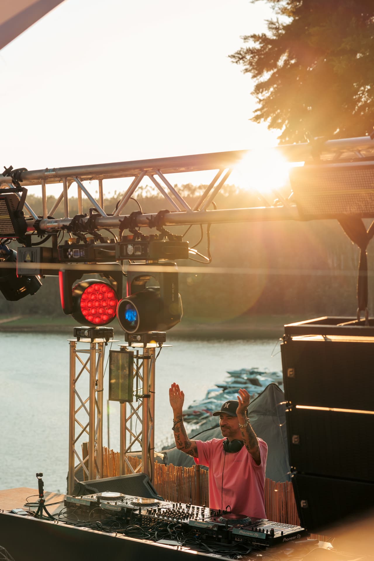 DJ in backlight at sunset